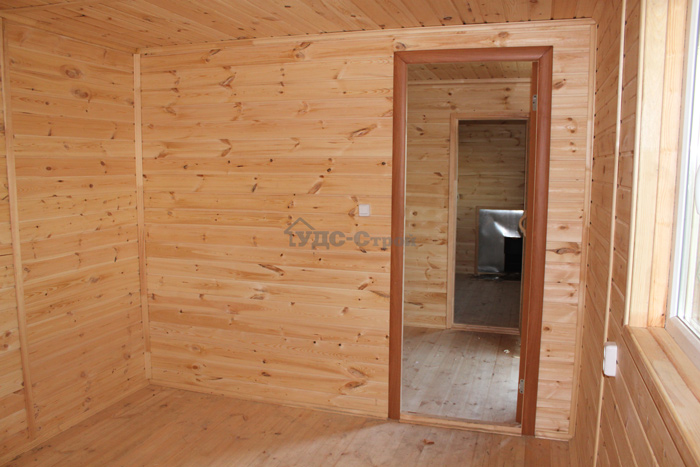 Модульный дом-баня размером 11×3 м с открытой верандой 6×2,5 м 
